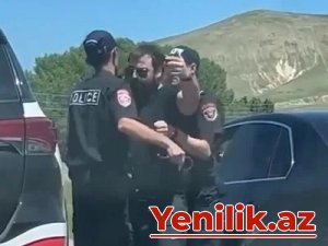 Ermənistanda nazir qardaşı polisi döymək istədi